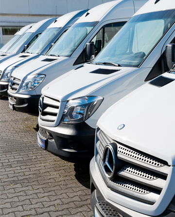 Fleet of white delivery vans