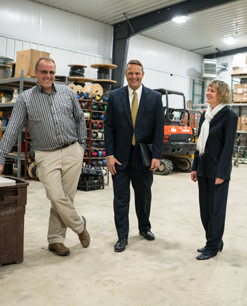 Nick Kleyn, owner of Kleyn Electric, agent Jim Ryskamp of Berends Hendricks Stuit (BHS), and FCCI Senior Marketing Underwriter Lori Herman