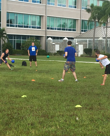FCCI teammates play dodgeball to raise money for charity organizations during Fall Fest